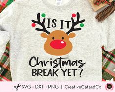 a shirt that says, is it christmas break yet? with reindeer antlers on it