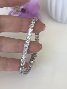 ***This bracelet is also on Promotional Sale Right Now at 30% Off!***Solid Sterling Silver 925 with the finest 5mm 5A CZ Diamonds.***The bracelet is absolutely gorgeous, it is fresh just came out from our studio! ****Once you put it on, you’re not gonna want take it off!! It is incredibly comfortable ***Will Come in a boxBase:   Solid Sterling Silver 925Finish: White Gold Stone: 5A CZ Diamonds —————————————————————-* We accept returns and exchanges at buyer’s shipping expense. Just contact me wi Cubic Zirconia Channel Set Tennis Bracelet For Wedding, Silver Cubic Zirconia Bracelet Channel Set, Silver Cubic Zirconia Bracelets Channel Set, Luxury Princess Cut Tennis Bracelet For Wedding, Luxury Princess Cut Bracelets For Weddings, Formal Princess Cut Diamond Bracelet, Cubic Zirconia Channel Set Tennis Bracelet As Gift, Channel Set Cubic Zirconia Tennis Bracelet As A Gift, Classic Cubic Zirconia Tennis Bracelet