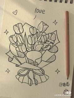 a drawing of a bouquet of tulips with the words love written on it