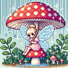 a cross stitch fairy sitting on top of a mushroom with an umbrella over her head