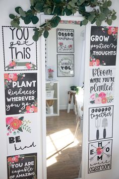 the door is decorated with flowers and sayings