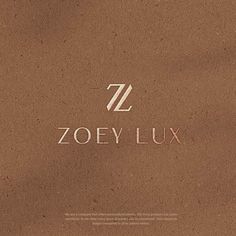 the z zey lux logo is shown on a brown surface