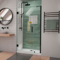 a bathroom with a shower, sink and mirror