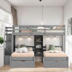 two bunk beds with drawers underneath them in a room