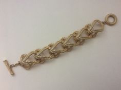 "Givenchy brushed gold, matte gold, satin gold twisted wire link bracelet Very good condition size - 7.5\" with clasp x 1\"" Gold Satin, Twisted Wire, Rhinestone Necklace, Metal Necklaces, Clear Rhinestones, Matte Gold, Chain Link Bracelet, Link Bracelets, Chain Link