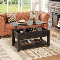 a living room with a couch, coffee table and fire place in front of the fireplace