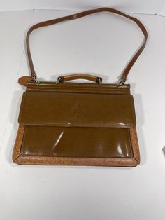 Vintage Belle Rose Satchel Brown Two Tone Leather Women's Purse Handbag**read. This is a very nice purse and the outside is in very good condition but the inside has some flaw ( the stich is loose. You may be able to fix it by simply glueing it. Please check last picture to understand. Thanks Cx42 Designer Brown Bag For School, Designer Brown School Bag, Vintage Satchel With Detachable Strap For Business, Vintage Business Satchel With Detachable Strap, Vintage Brown Briefcase With Detachable Strap, Vintage Leather Bags For Office, Vintage Leather Office Bags, Vintage Brown Crossbody Briefcase, Vintage Crossbody Bag For Business