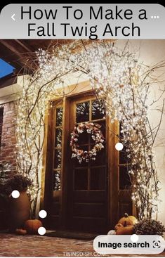 the front door is decorated with fake flowers and branches for fall decorating it's entrance