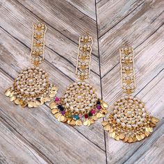 Kundan Bridal Wedding Pipal Patti  Beads Designer Bridal Tikka Jewelry |Bollywood Kundan Tikka| Wedding Tikka set This product is Imitation & hence the product can be non-uniform & vary in color & texture. Color : Multi Gorgeous  Kundan Gold Plated Tikka jewelry Set EXPEDITED DELIVERY (Chargeable) : Delivered 3 to 4 working days STANDARD DELIVERY (Free) : Delivered 8 to 10 working days Bridal Tikka, Maang Tikka Kundan, Tikka Jewelry, Chain Headpiece, Hair Chains, Maang Tikka, Color Textures, Bridal Wedding, Hair Jewelry