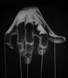 a drawing of a hand reaching out from the ground with string attached to it's fingers