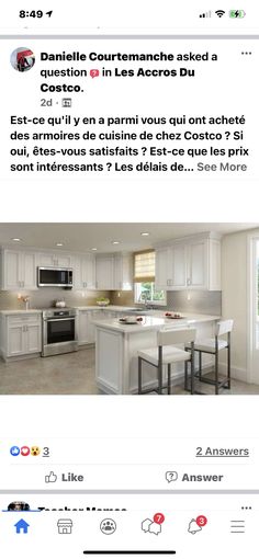 an image of a kitchen with white cabinets and counter tops in the middle of it