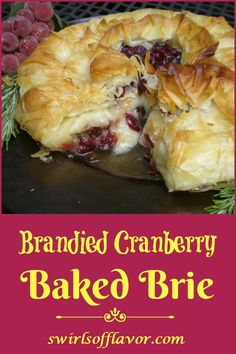 cranberry baked brie on a plate with the words, brandied cranberry baked brie