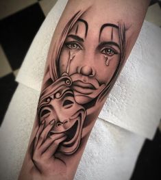 a man's arm with a mask on it and a woman's face