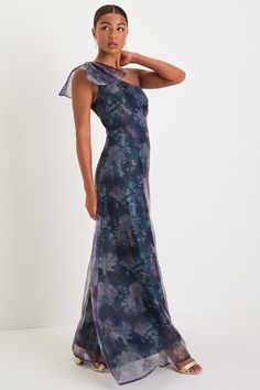 Bring on the Prosecco and adoring glances, because the Lulus Beyond Fabulous Blue Floral Organza One-Shoulder Maxi Dress is ready for any glamorous gala this season! Airy woven organza boasts a stunning floral design throughout as it shapes a sleeveless bodice, a one-shoulder neckline, and a wide strap adorned with an oversized bow detail. The high, fitted waist tops an A-line skirt that cascades down to an elegant maxi hem. Hidden back zipper/clasp. Fit: This garment fits true to size. Length: Spring One Shoulder Evening Dress For Gala, One-shoulder Evening Dress For Spring Gala, Spring One-shoulder Evening Dress For Gala, One Shoulder Evening Dress For Spring Gala, Elegant Summer One Shoulder Dress For Gala, Glamorous One Shoulder Dress For Spring Gala, Elegant One-shoulder Dress For Summer Gala, Elegant Summer One-shoulder Dress For Gala, Elegant One Shoulder Floor-length Dress For Spring