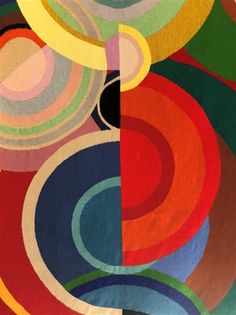 an abstract painting with many colors and shapes on it's surface, including circles