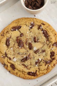 a cookie with chocolate chips and coconut flakes