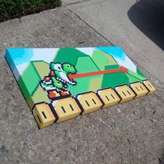 an image of a video game being played on the ground with graffiti painted on it