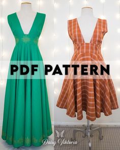 two dresses on mannequins, one in orange and the other in green