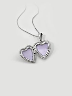 DESCRIPTIONWe heard you, white gold lovers! Get the silver look but without the tarnishing!A white gold sweet heart locket is placed on our 0.5mm Box Chain, with lots of love and nostalgia, too. Locket holds up to 2 images so be sure to include your bestie, lover, dog, or yourself...we won't judge <3 DETAILS - always made in 14k white gold- pendant measurement: 13mm x 12mm- model wears a 16” White Gold Heart Pendant Locket Necklace For Gift, Double Heart Locket Necklace In White Gold, Double Heart White Gold Locket Necklace, White Gold Heart Pendant Locket Necklace With Heart Charm, White Gold Heart Locket Necklace With Heart Charm, White Gold Jewelry With Heart Charm For Keepsake, White Gold Jewelry With Heart Charm Keepsake, White Gold Double Heart Locket Necklace, White Gold Heart Keepsake Jewelry