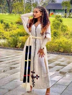 A Modern Dress Eritrean Dress, Beautiful Ethiopian, Ethiopian Clothing, Ethiopian Traditional Dress, Ethiopian Dress, Habesha Kemis, Dress Stylish, Colorful Embroidery, Intricate Embroidery