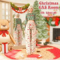 an animated image of a woman in pajamas next to a teddy bear and christmas tree