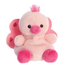 a pink stuffed animal with hearts on its wings