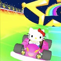 an animated hello kitty driving a toy car on the nintendo game mario kart track