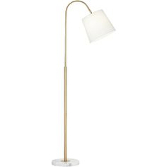 a floor lamp with a white shade on the top and a gold metal pole underneath