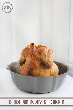 a chicken in a pan sitting on a counter with the words buildi pan rotissee chicken