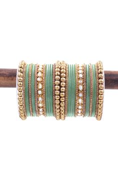 Experience traditional elegance with our Luxurious Ethnic Bangle Set. These alluring ornaments are crafted from high-quality alloy material, designed to last for years. A perfect match for any outfit, they lend an ethereal grace to your overall look. Comes in a set of beautifully crafted pieces with intricate details, resonating the allure of rich heritage. Excellent for gifting and personal use, add these gorgeous ethnic bangles to your collection today. Green Bangles Set, Green Bangles, Sea Green Color, Bangles Set, Grace To You, Eid Collection, Bangle Set, Sea Green, Intricate Details