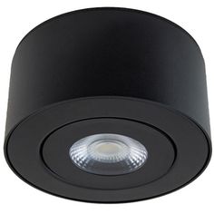 a black downlight that is on the ceiling