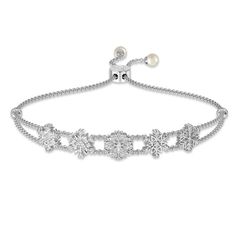 Snowflakes from above are loved ones sending their love…This elegant silver-plated bracelet features a remarkable 95 simulated diamonds.Two snowy white pearls grace the ends of the bracelet.The words “Kisses from Heaven” are engraved on the bolo slide, serving as a reminder of the love your loved one sends from above.The poem “Kisses from Heaven” by beloved poet Deborah J. Birdoes is included on a keepsake card that you can tuck in a special place to see each day. Elegant Snowflake Jewelry For Formal Occasions, Elegant Snowflake Shaped Cubic Zirconia Jewelry, White Cubic Zirconia Bracelet For Anniversary, White Cubic Zirconia Anniversary Bracelets, White Cubic Zirconia Anniversary Bracelet, White Sterling Silver Bracelet With Diamond Accents For Wedding, Elegant Snowflake Jewelry For Wedding, White Sterling Silver Diamond Bracelet For Anniversary, White Snowflake Jewelry For Anniversary