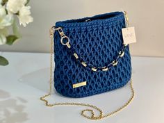 VANE Handmade Handbag Anita Crochet bag made of polyester yarn in the color jeans - Removable metal strap in gold and blue - High-quality inner pocket with small inner compartment - Dust bag, perfect for safe storage Dimensions: 22x27x12 cm Elegant Blue Crochet Bag For Everyday Use, Elegant Blue Crochet Bag, Chic Blue Crochet Shoulder Bag, Chic Blue Crochet Bag For Daily Use, Chic Handmade Blue Shoulder Bag, Everyday Handmade Gold Shoulder Bag, Bag Video, Crochet Shoulder Bags, Color Jeans