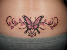 a woman's stomach with a butterfly and hearts tattoo on the back of her belly