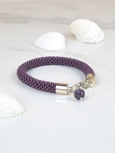 Handmade beaded bracelet, Nepalese-style, color dark purple. Bracelet crocheted from small Czech glass beads. Clasp - silver color jewelry metal. The bracelet has a beautiful pendant Czech glass bead. Bracelet length with clasp about 7.48 inches (19cm). The bracelet can be put on in two ways: either by fastening it with a clasp or by putting it on already fastened (as shown in the video). IMPORTANT: Please ensure to measure your wrist accurately before placing your order to ensure the bracelet f Bracelet With Pendant, Czech Glass Bead Bracelet, Purple Bracelet, Seed Bead Bracelet, Color Jewelry, Purple Necklace, Jewelry Metal, Bead Bangles, Small Gift Boxes