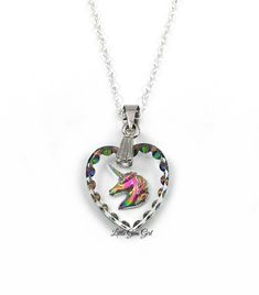 Unicorn Necklace - Rainbow Unicorn Pendant - 15x14mm Engraved Unicorn Heart Charm - Etched Glass with Unicorn Sterling Silver Chain Option This gorgeous Unicorn pendant is a miniature work of art! 15x14mm glass heart contains the carving of a rainbow unicorn and is surrounded by rainbow etchings along the edge. It's reversible - one side is flat with richer rainbow colors and the other side is carved with softer rainbow colors. Comes with a 20 inch sterling silver link chain or a silver plated l Unicorn Pendant, Unicorn Necklace, Silver Link Chain, Rainbow Necklace, Etched Glass, Delicate Jewelry, Rainbow Unicorn, Glass Heart, Star Of David