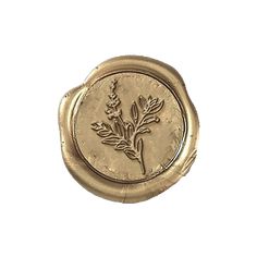 a wax stamp with a plant on it