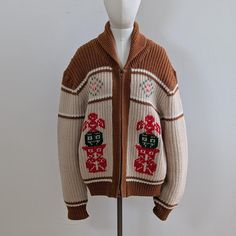 1970's Knit Cowichan Mary Maxim Sweater Totem Pole Design, From Simpsons, Sears Estimated date 1970's/1980's 🧶 100% Acrylic Measurements: Laid Flat P2p 22" Bottom 22" Shoulder 24" Sleeve L 25 & Cuff. 5" Retro Knitted Outerwear For Fall, Vintage Beige Knit Outerwear, Vintage Knitted Beige Outerwear, Beige Knitted Retro Sweater, Retro Beige Knitted Sweater, Retro Beige Knit Sweater, Retro Patchwork Sweater For Winter, Vintage Knit Outerwear For Winter, Retro Patchwork Winter Sweater