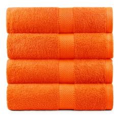 three orange towels stacked on top of each other