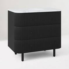 a black and white dresser with two drawers