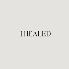 the word i healed in black and white on a gray background with an image of a