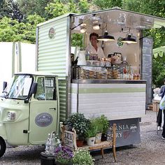 a food truck parked on the side of a road