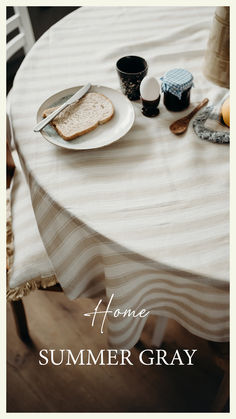 a white table topped with a plate of food