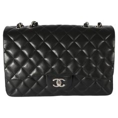 Listing Title: Chanel Black Lambskin Jumbo Single Flap Bag SKU: 128457 Condition: Pre-owned Condition Description: A timeless classic that never goes out of style, the flap bag from Chanel dates back to 1955 and has seen a number of updates. The design was revolutionary for its time, giving its wearers the freedom to carry their everyday must-haves without the cumbersome nature of a larger bag. The bag features the classic leather-entwined chain-link shoulder strap for a distinctive aesthetic. H Luxury Double Flap Shoulder Bag For Formal Occasions, Luxury Business Shoulder Bag With Double Flap, Luxury Double Flap Business Bags, Luxury Double Flap Shoulder Bag For Business, Classic Business Flap Bag With Dust Bag, Classic Flap Bag With Palladium Hardware, Classic Leather Bag With Cc Turnlock Closure, Classic Evening Shoulder Bag With Cc Turnlock Closure, Classic Double Flap Evening Bag