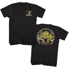 a black t - shirt with yellow and white designs on the front, featuring an image of a dragon