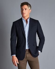 100% wool, Available in slim fit and classic fit, 100% Woolmark certified fine Merino wool, Back panel lining: 52% polyester, 48% viscose in navy, Lining: Front panel 100% polyester in exclusive Charles Tyrwhitt lapwing design in navy, Contrast piping in blue to add a striking pop of colour on the interior lining, Single breasted, two-button fastening with four button cuff using Urea buttons, Canvas chest piece construction - Proper Blazer - Navy | Men's Charles Tyrwhitt Proper Blazer - Navy Blu Men’s Suit Capsule Wardrobe, Men’s Business Style 2023, Blazer No Tie Men, Men Sport Jacket Outfit, Shoes For Grey Suit Men, Mens Sport Coat Outfit Formal, Men Blazers Outfit, Men Bussines Casual Outfit, Business Casual Blazer Outfits Men