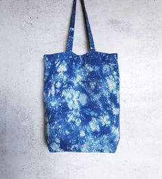 "This unique tote bag is hand-crafted from 100% off-white linen.  I have applied an Marbled Shibori resist technique then hand dyed with natural Indigo dye Each side of the bag has a variation of the design which resembles a wild blue and white garden or jungle.  Such a super cool  tote bag will go with everything, and take you anywhere from the beach to the bistro.   Just like your denim jeans this is must have wardrobe staple that will never go out of fashion.  FEATURES: *  two long shoulder s Hand Dyed Rectangular Bags For Daily Use, Everyday Hand Dyed Tote Bag, Everyday Hand-dyed Tote Bag, Everyday Hand Dyed Cotton Bags, Tie Dye Rectangular Bag For Everyday Use, Rectangular Tie Dye Bag For Everyday Use, Rectangular Tie-dye Bag For Daily Use, Daily Use Tie-dye Tote Bag, Daily Use Tie-dye Rectangular Bag