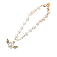 a pearl and diamond necklace on a gold plated chain with a butterfly charm hanging from it