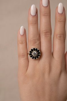 Sapphire Cluster Ring With Rose Cut Diamonds, Elegant 14k Gold Jewelry With Black Diamonds, Cubic Zirconia Cluster Jewelry With Halo, Halo Cluster Jewelry In Cubic Zirconia, Black Round Halo Jewelry, Round Black Halo Jewelry, Black Diamond Round Cut Ring, Black Diamonds Round Diamond Ring For Gift, Black Halo Jewelry For Anniversary