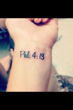 a woman's wrist with the word phil 4 19 tattooed on it